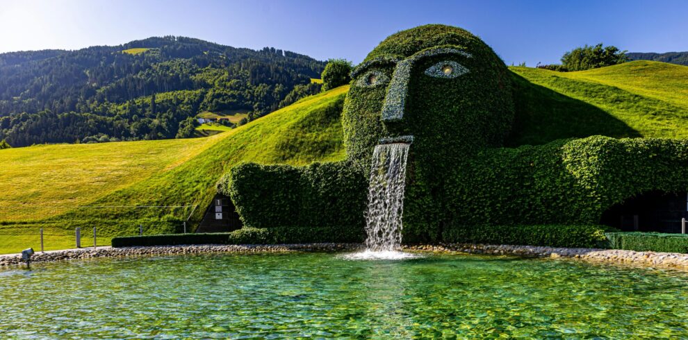 Swarovski Crystal Worlds giant grass head with waterfall in Wattens Austria during Europe tour