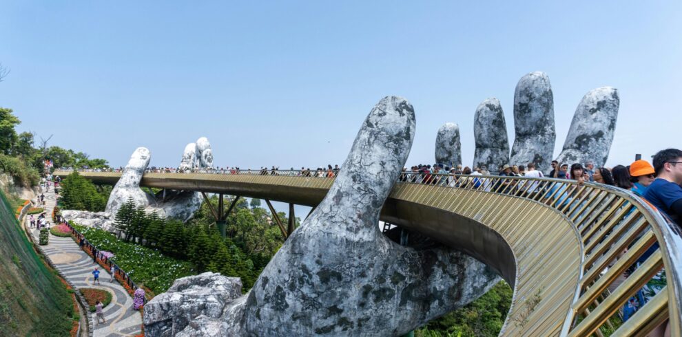 Golden Bridge Ba Na Hills Da Nang Vietnam with giant stone hands