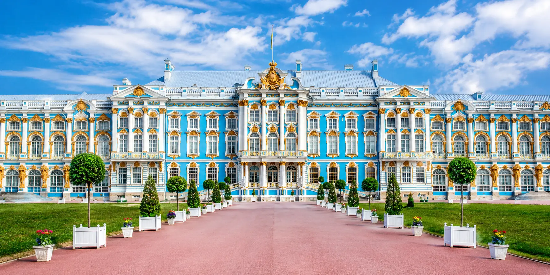 Catherine Palace in Pushkin, Russia, featuring its iconic blue-and-white facade with golden details